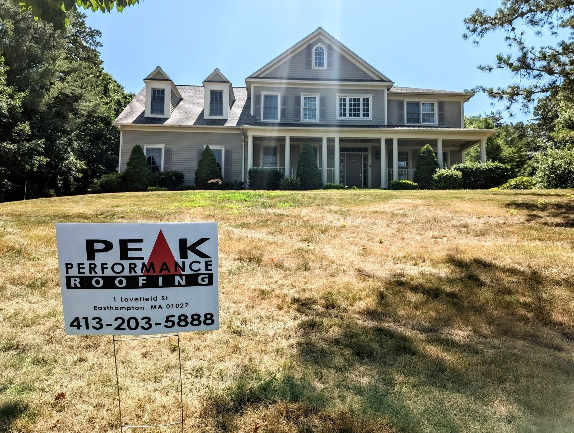 Roofer installing a new roof in Easthampton, MA
