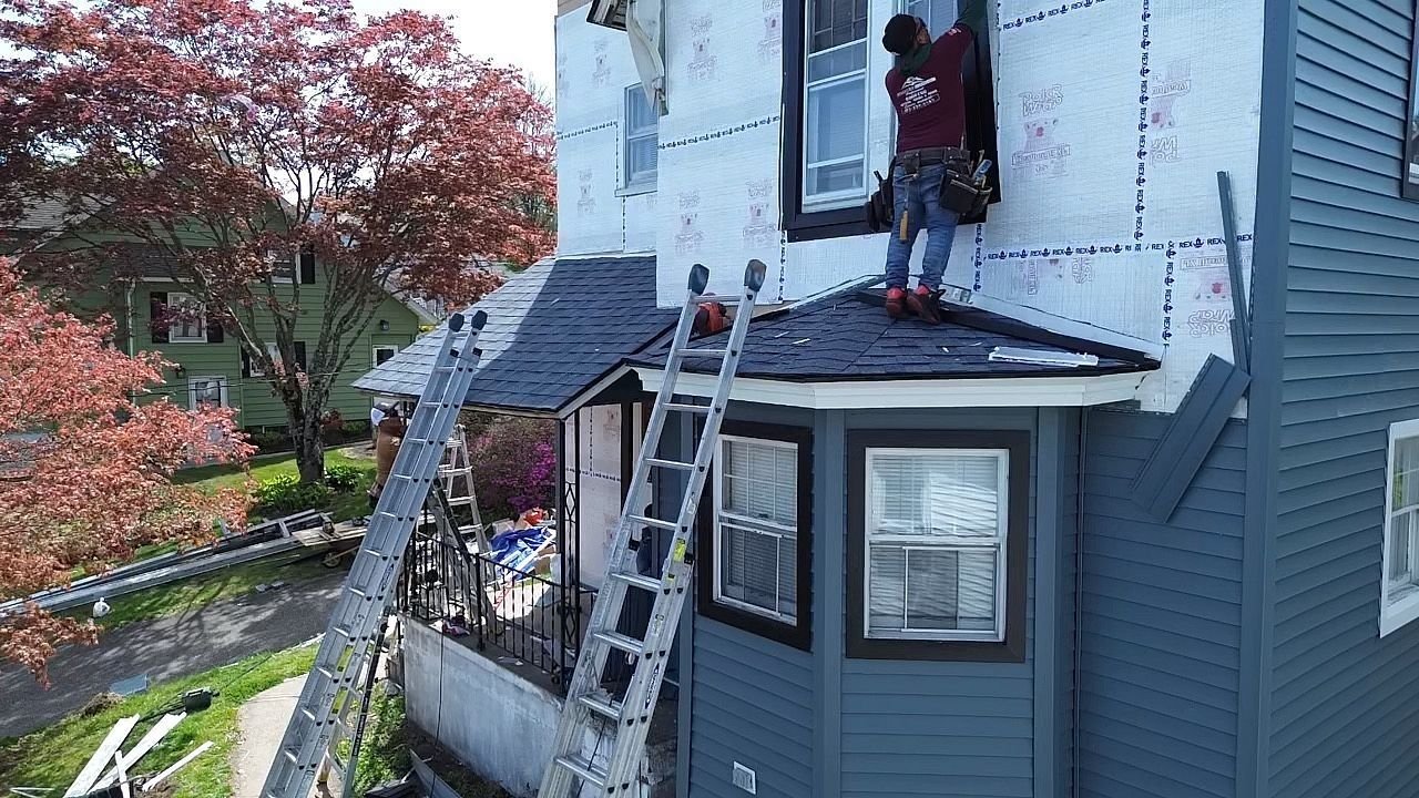 Roofer installing a new roof in Waterbury, CT