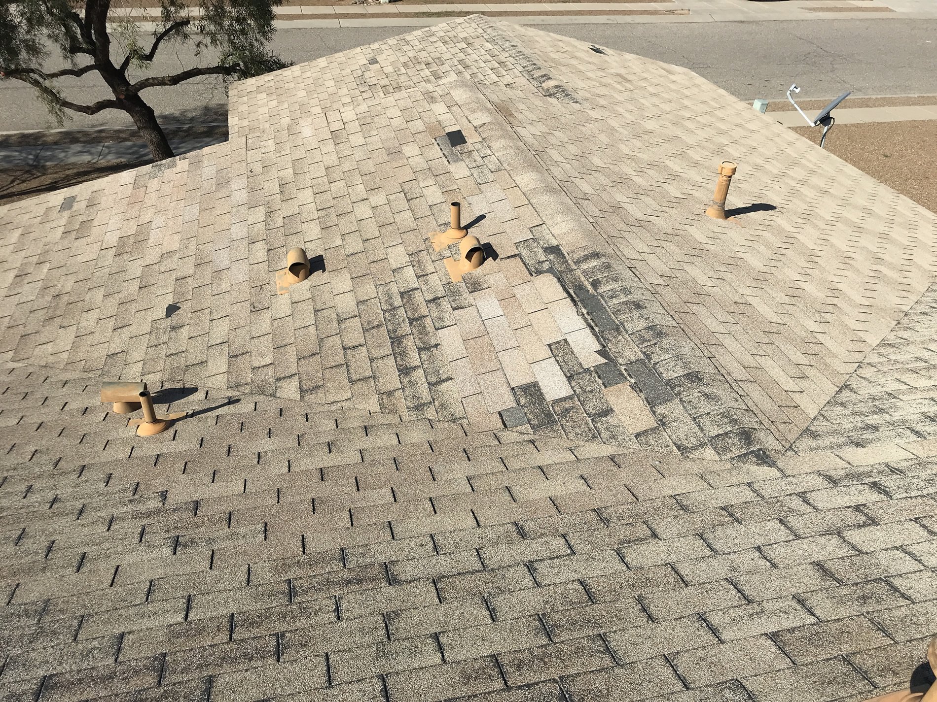 Roofer installing a new roof in Tucson, AZ